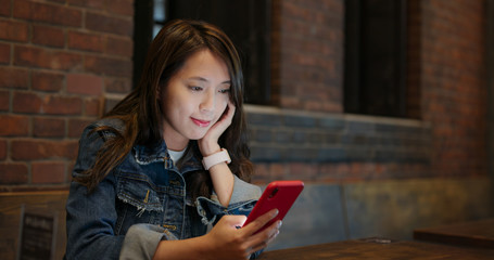 Wall Mural - Woman use of mobile phone for order food in restaurant