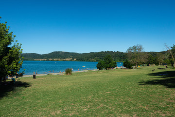 Summer scene on Martignano lake in Italy