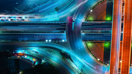 aerial view expressway motorway highway circus intersection at night time top view , road traffic in
