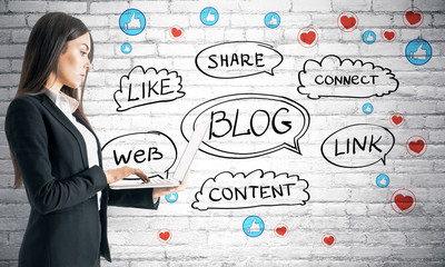 Poster - Social network concept with blogger at light brick wall with hand drawn words and icons background.