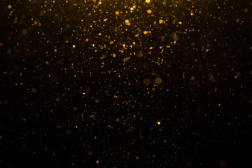 Abstract gold bokeh with black