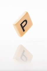 Wall Mural - Alphabet P word block with white background.