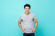 © Atstock Productions - Handsome smiling friendly Asian man in plain t-shirt