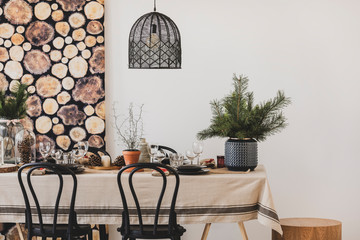 Wall Mural - black chairs and pendant lamp in dining room