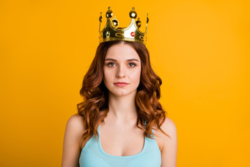 Sticker - Photo of foxy not smiling lady wear tank-top and big golden crown isolated yellow background