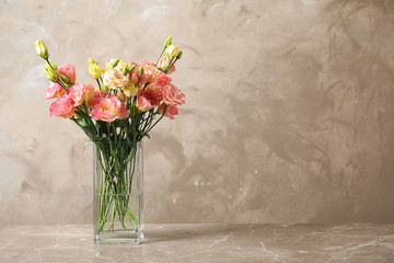 Sticker - Eustoma flowers in vase on table near beige wall, space for text