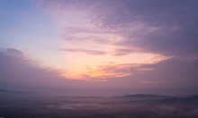 Magical Sunet With Sea Of Clouds. Landscape Photo Was Taken From Wang Pha Mek, Highlands Of Trang, Thailand.