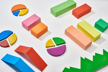 Wall Mural - color blocks and pie charts with shadow on white background