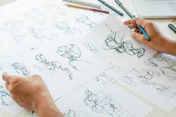 Wall Mural - Animator designer Development designing drawing sketching development creating graphic pose characters sci-fi robot Cartoon illustration animation video game film production , animation design studio.