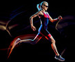 © snaptitude - one caucasian woman triathlon triathlete runner running joogger jogging studio shot isolated on black background with light painting effect