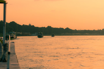 Wall Mural - Sunset on the Irrawaddy River (Ayeyarwaddy River) in Bagan, Myanmar (Burma)