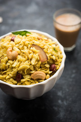 Canvas Print - Jada Poha Namkeen Chivda / Thick Pohe Chiwda is a jar snack with a mix of sweet, salty and nuts flavours, served with tea. selective focus