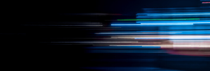 Wall Mural - Abstract motion light trails on the dark background