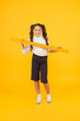 © be free - School student study geometry. Tell me about distance. Kid school uniform hold ruler. Pupil cute girl with big ruler. Geometry school subject. Education and school concept. Sizing and measuring