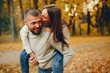 © prostooleh - Couple in a park. Family in a golden forest. Man with a beard