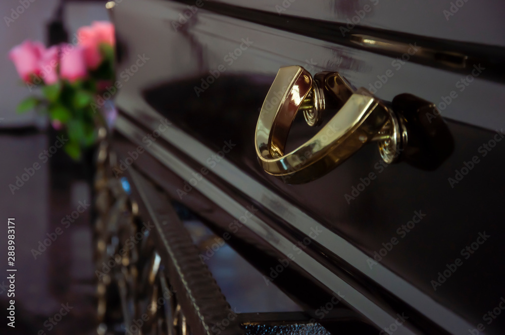 closeup shot of a colorful casket in a hearse or chapel before funeral or burial at cemetery - obrazy, fototapety, plakaty 
