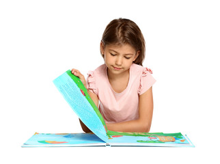 Wall Mural - Cute little girl reading book on white background