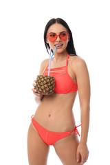 Poster - Beautiful young woman in stylish bikini with cocktail on white background