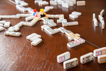 Mexican Train Game Showing Dominoes, Trains And Play Setup.  A Great Game For Family Or Friends.