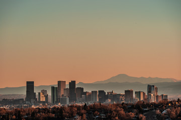 Denver skyline against a background of mountains