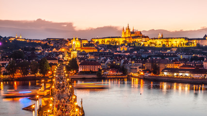 Wall Mural - Prague Castle, Charles Bridge and Vltava River. Evening panoramic view from Old Town Bridge Tower, Prague, Czech Republic