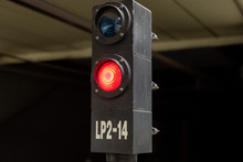 Traffic Light Shows Red Signal On Railway. Subway Station.