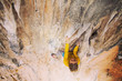 © Vitalii Nesterchuk - Climber overcomes challenging climbing route. A girl climbs a rock. Woman engaged in extreme sport. Extreme hobby.