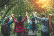© 2B - Group of senior adults trekking in the forest
