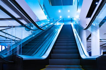 Poster - Escalator. Moving staircase. Escalator Steps. Stairs. Lifting and transporting machine. Moving staircase in the subway. Staircase with electric drive. Repair and maintenance of the escalator.