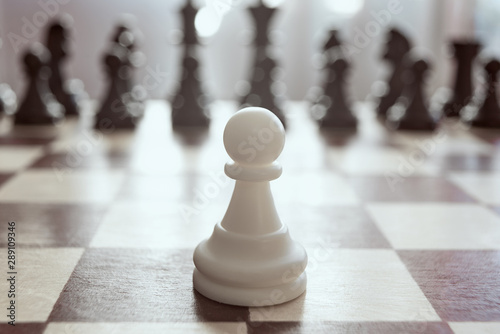 Single pawn against many enemies as a symbol of difficult unequal fight or struggle of minorities Tableau sur Toile