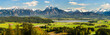 canvas print picture - Panorama Landschaft in Bayern mit Hopfensee im Allgäu und der Bergkette der Alpen mit Berg Säuling vor Füssen