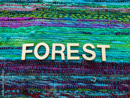 Wooden Text Letters With The Word Forest For A Sign Banner