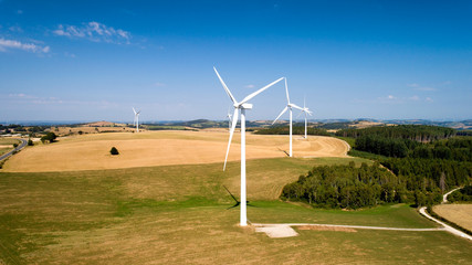 Wall Mural - Aerial photo of wind turbines in the fields, Aveyron