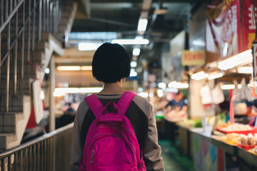 Sticker - traveling woman in the traditional marketplace