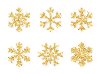 Wall Mural - shining gold snowflakes on white background. christmas and new year background. vector illustration