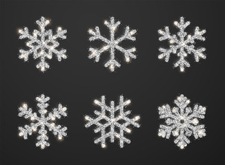 Wall Mural - shining silver snowflakes on black background. christmas and new year background. vector illustratio