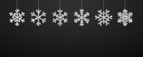 Wall Mural - shining silver snowflakes on black background. christmas and new year background. vector illustratio
