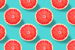 Vivid fruit pattern of fresh grapefruit on colourful background