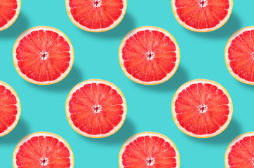 Poster - Vivid fruit pattern of fresh grapefruit on colourful background