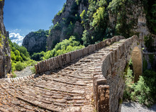 The Noutsou Bridge (or Kokkori, As It Is Also Known), A Single Arch Stone Bridge, Is Located In Central Zagori, Between The Villages Of Koukouli, Dilofo And Kipoi