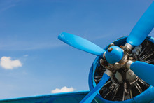 Close Up Abstract Of A Vintage Airplane Propeller Engine Against Blue Sky, Closeup. Travel Concept