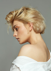 Wall Mural - Face profile of blonde woman with short hair