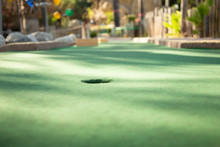A Ground Level View Of A Miniature Golf Course Hole
