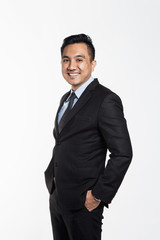 Asian man in office suit posing