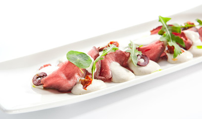 Wall Mural - Beef vitello tonnato platter closeup