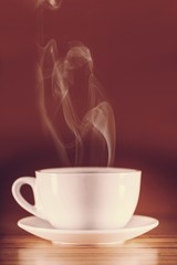 Canvas Print - Red hot cup of coffee on black background