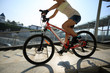© lzf - Riding bike down stairs of overpass in city