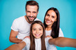 © deagreez - Photo of daddy mommy and small lady making selfies wear casual outfit isolated blue background