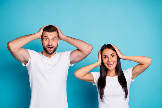 Photo of excited pair not believe successful happening wear casual outfit isolated blue background