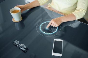 Poster - technology and people concept - close up of woman using interactive panel and drinking coffee